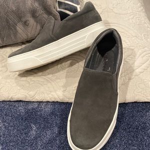 Platform J slides in a gray suede to finish
